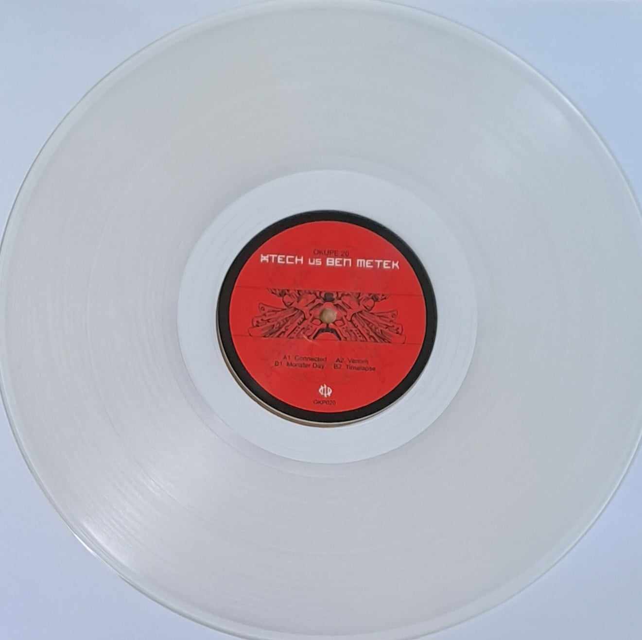 Okupe 20 (transparent) (toute dernière copie en stock) - vinyle freetekno